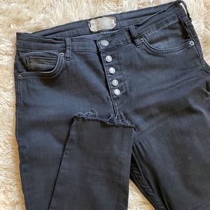skinny, hi-rise Free People jeans w/frayed hem